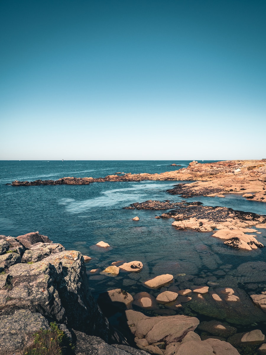 week end bretagne rocky shore under blue sky during daytime